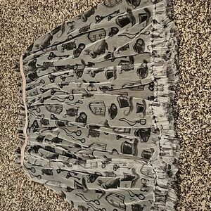 D.siged by Disney. Girls M (10-12) Alice in wonderland skirt. Black, white, pink